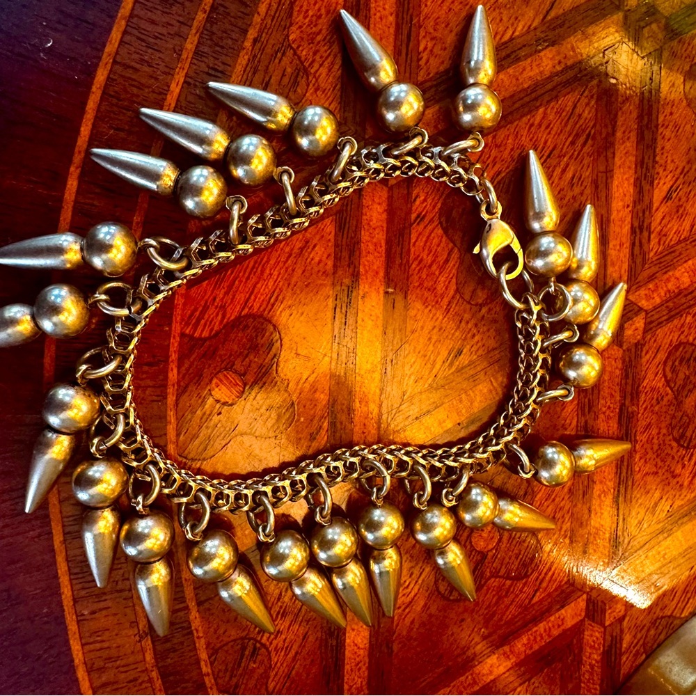 Dynamic Gold Spike Bracelet with Textured Beads